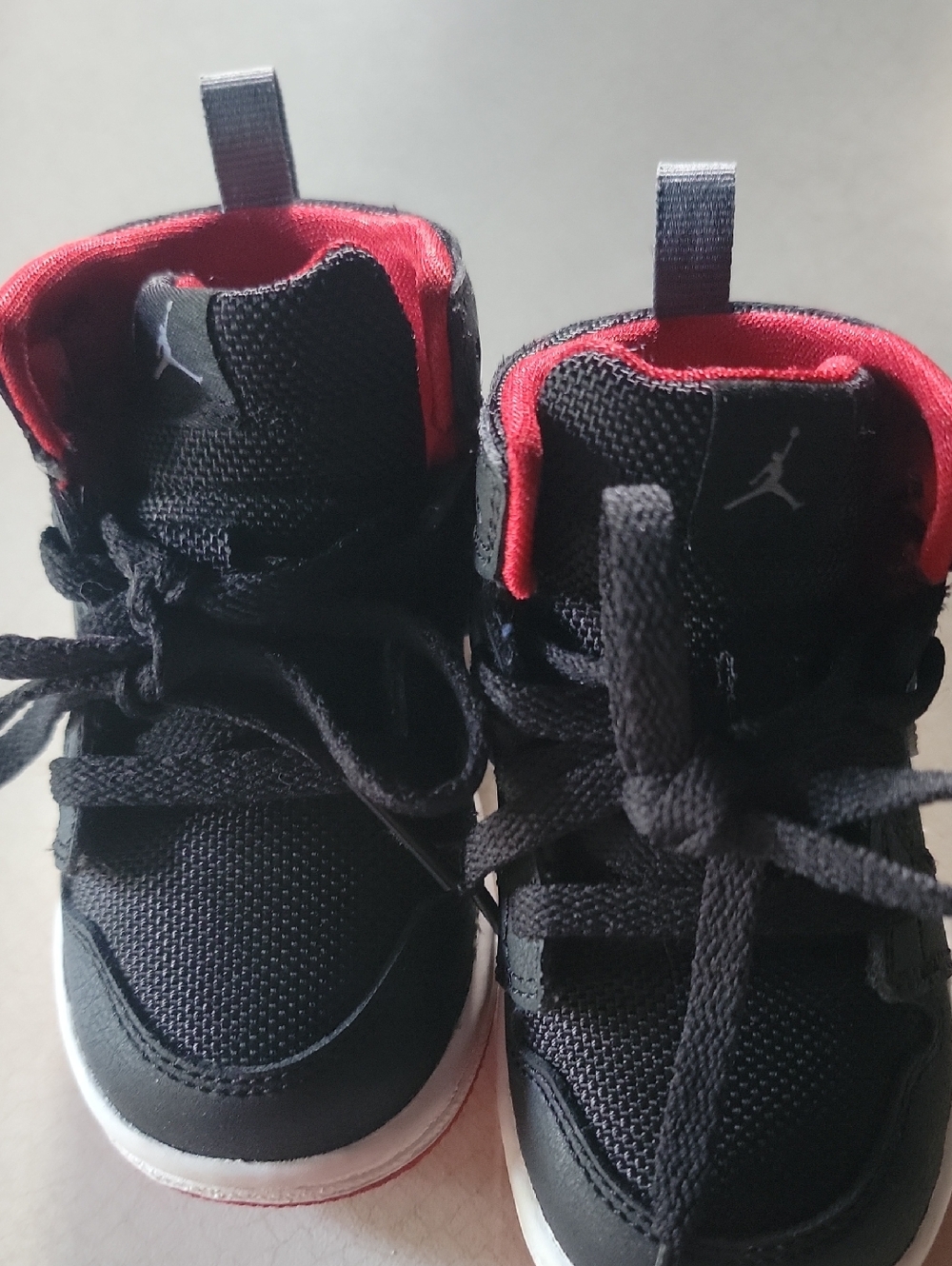 Jordan Kids Black and Red High-Top Sneakers